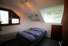Schöne 2-Zimmer-Dachgeschosswohnung mit Tiefgaragenstellplatz - Schlafzimmer